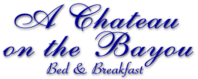 White sign with navy blue caligraphy - A Chateau on the Bayou Bed and Breakfast