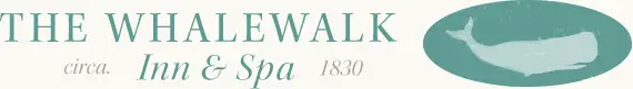 whalewalk inn logo featureing a silhouette of a humpback whale